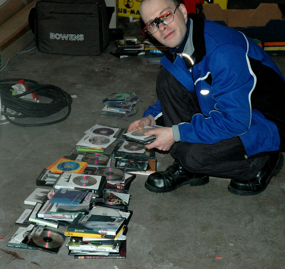 guy with many DVDs